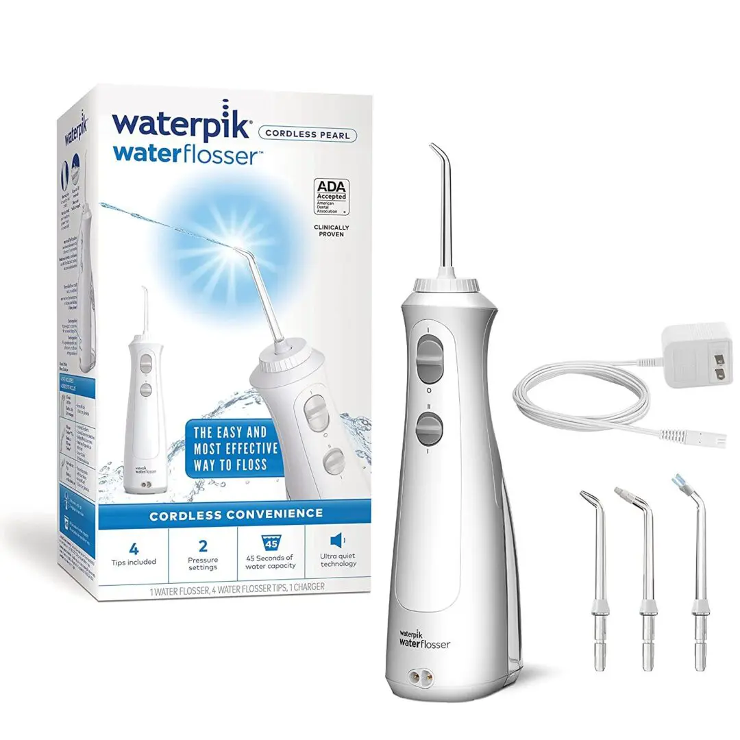 A box of water pik with four different types of probes.